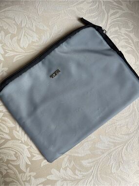 gray TUMI for Delta Airlines zippered travel pouch